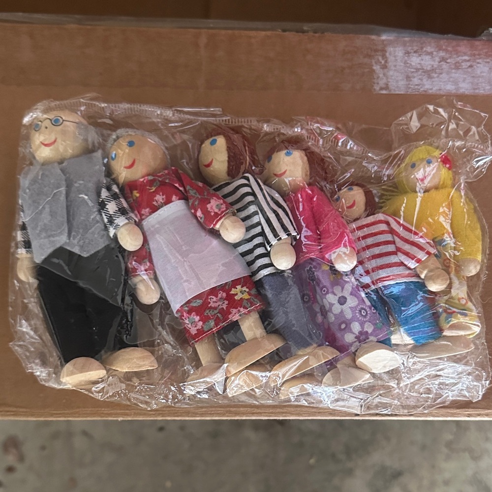 New in package! Colorful Wooden Family Doll Set